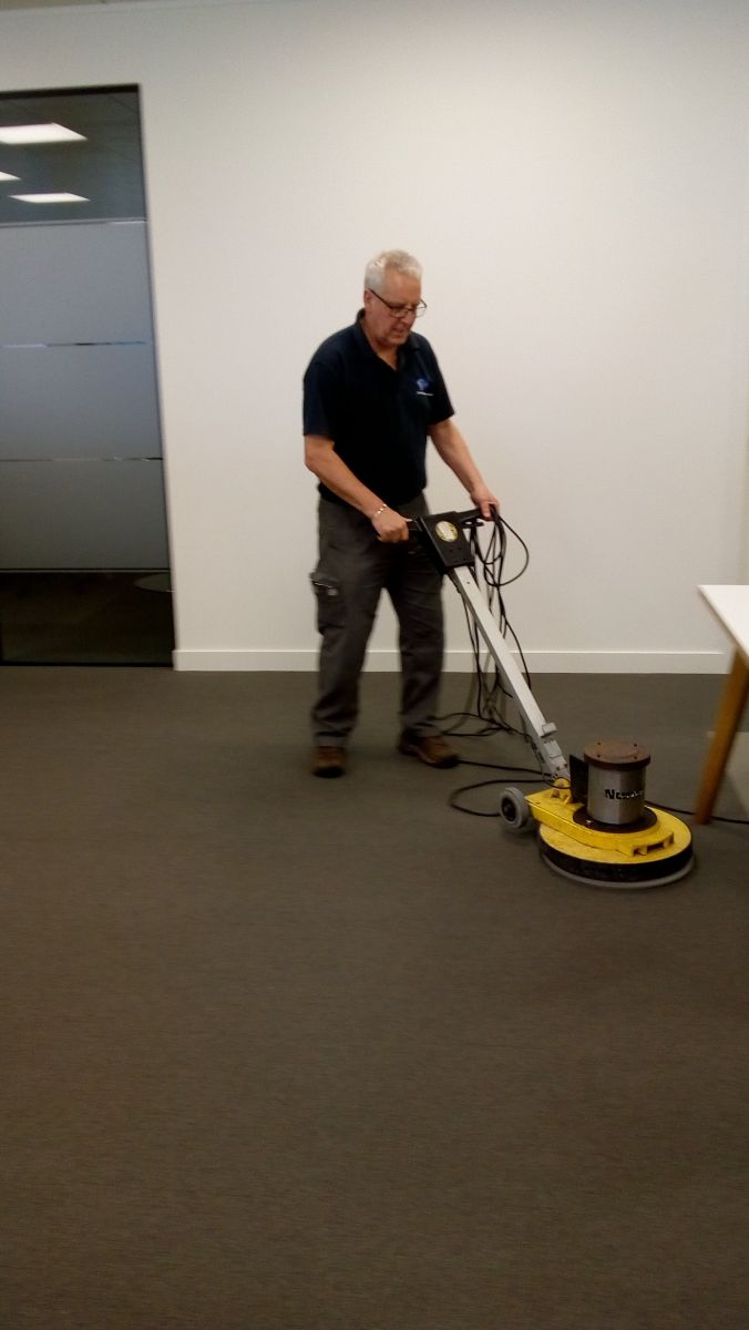 John from LDM Services cleaning office carpets
